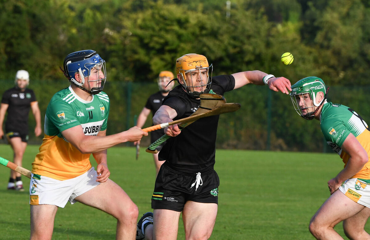 Ronan O'Connell of Bride Rovers battling Castlelyons' Leo Sexton. Picture: Howard Crowdy