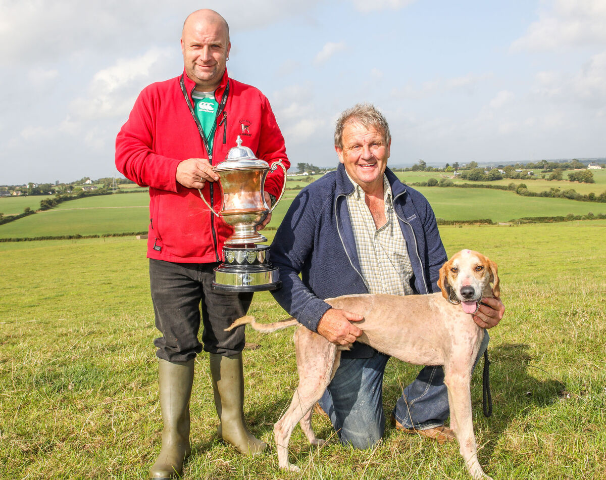 Damian Wade presents the Senior Maiden Trophy to Vincent Murphy with his dog Ferry Bill. Picture: David Creedon