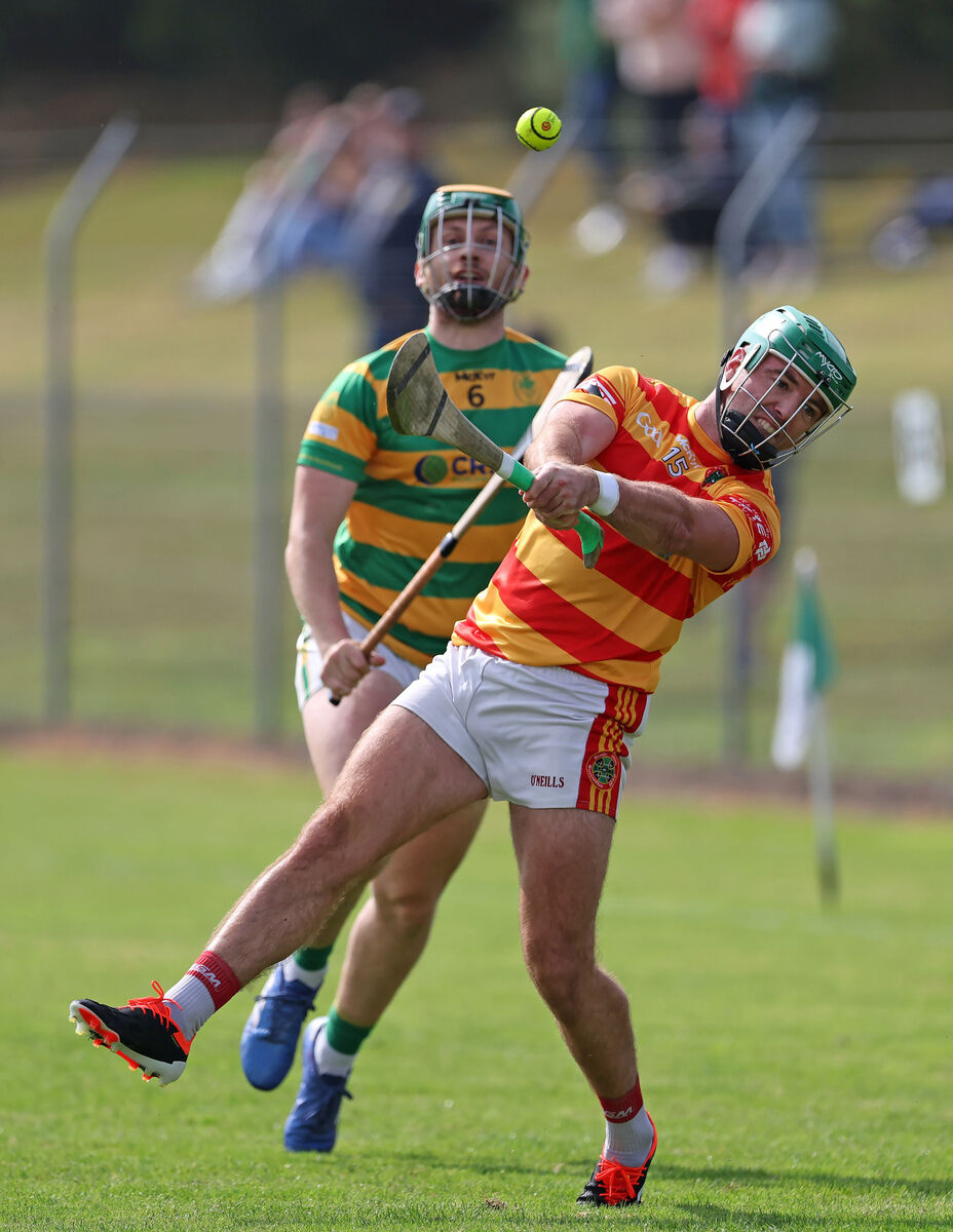  Alan O'Callaghan, Blackrock, close in on Jack Meade, Newcestown. Picture: Jim Coughlan.