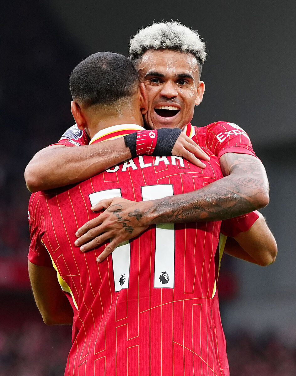 Liverpool's Mohamed Salah celebrates scoring their side's second goal of the game with team-mate Luis Diaz during the Premier League match against Brentford at Anfield, Liverpool. Picture: Peter Byrne/PA Wire