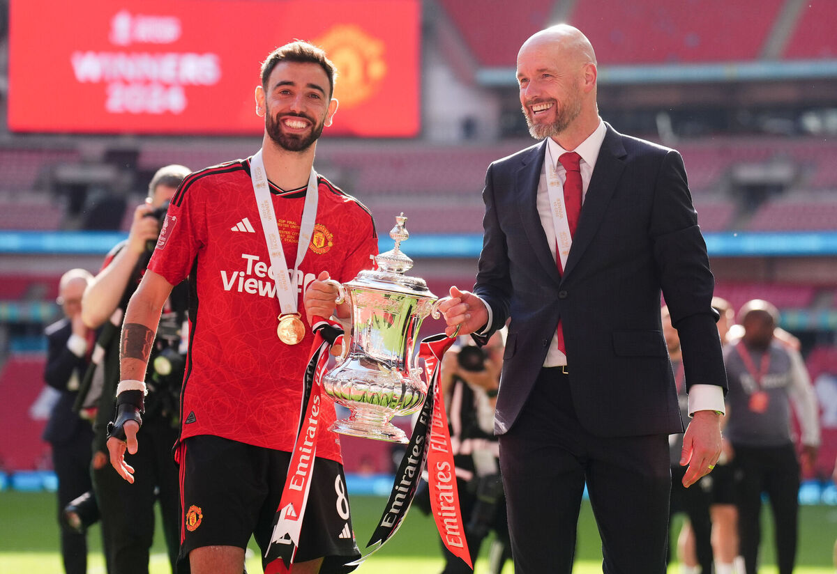Manchester United's Bruno Fernandes and manager Erik ten Hag with the FA Cup Trophy at Wembley Stadium, London. Picture: John Walton/PA Wire