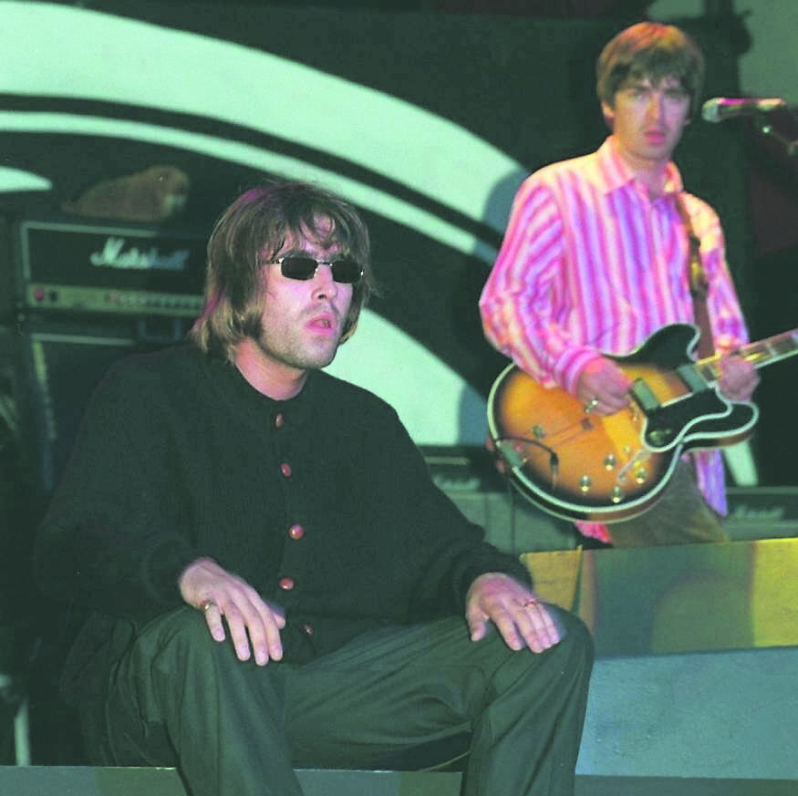 Oasis brothers Liam and Noel Gallagher on stage in Cork in 1996. 	Picture: Dan Linehan
                    