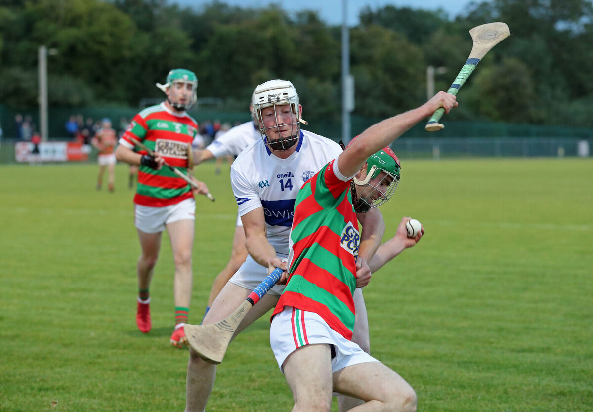 Milford's Tadhg O'Flynn put the pressure on John Good of Tracton in 2022. Picture: Jim Coughlan