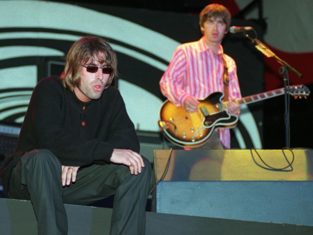 Oasis star Liam and Noel Gallagher on stage at Páirc Uí Chaoimh. Picture: Dan Linehan