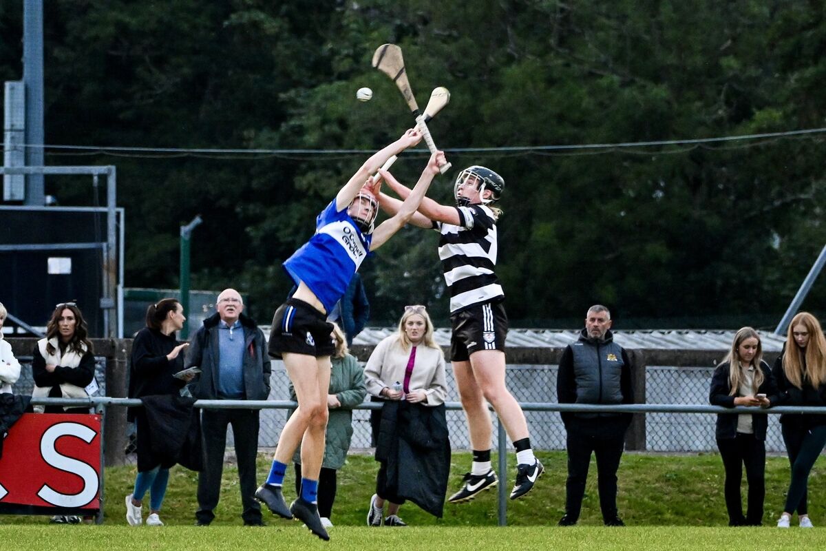 Midleton’s Cuan McMahon and Sarsfield’s Peader Egan fight for possession. Picture: Chani Anderson