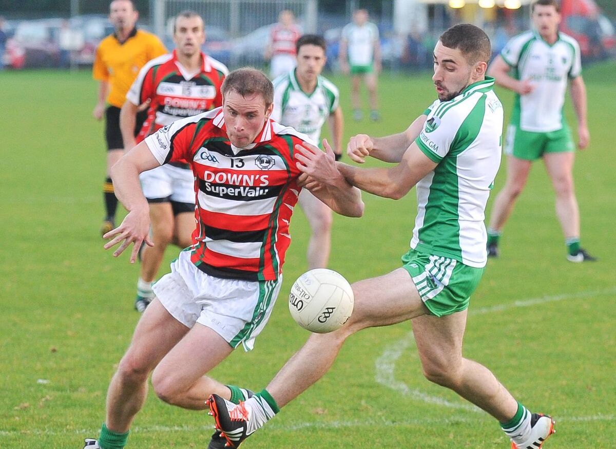 Ballincollig's John Kelly battles with Muskerry defender Kevin Barrett during their Cork SFC quarter-final clash at Cloughduv in 2014. Picture: David Keane