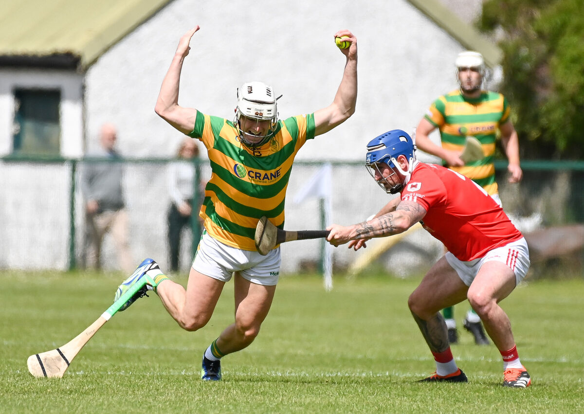 Blackrock's Robbie Cotter loses his hurley as he's challenged by Charleville's Darren Butler. Picture: David Keane.