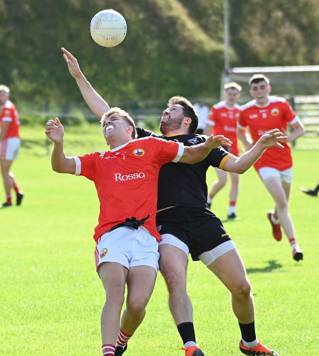 Fermoy's Tomás Clancy and O'Donovan Rossa's Dylan Hourihane tussle for the ball. Picture: Eddie O'Hare