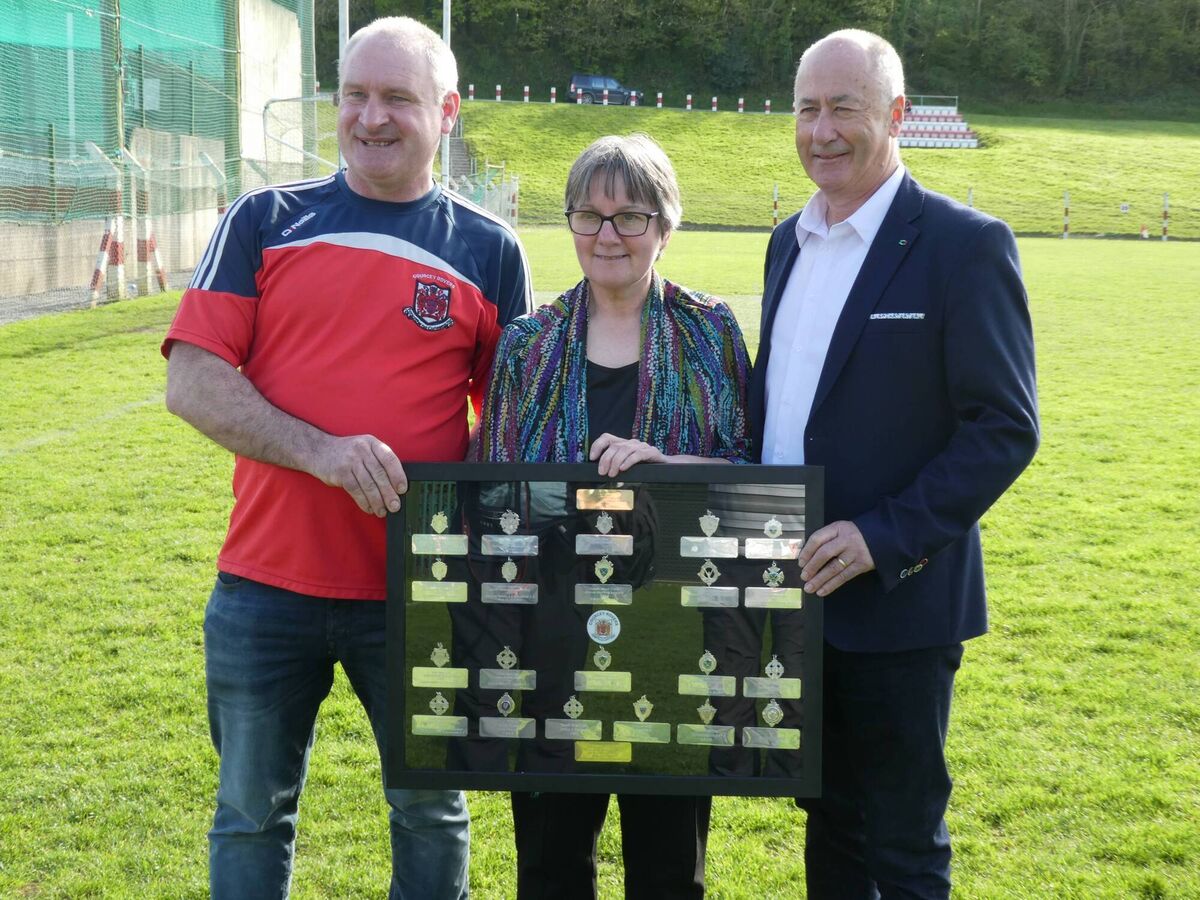 Jeremiah's cousins Kate Crowley and Alan Coleman present his medals to Stephen Harrington, Chairperson of Courcey Rovers GAA Club Jeremiah's cousins Kate Crowley and Alan Coleman present his medals to Stephen Harrington, Chairperson of Courcey Rovers GAA Club
