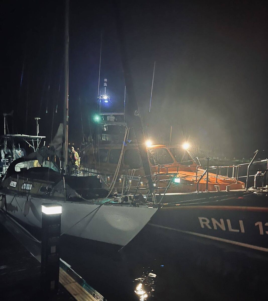 Courtmacsherry Lifeboat and the yacht berthing at the Dock Marina in Kinsale after the callout. Courtmacsherry Lifeboat and the yacht berthing at the Dock Marina in Kinsale after the callout.