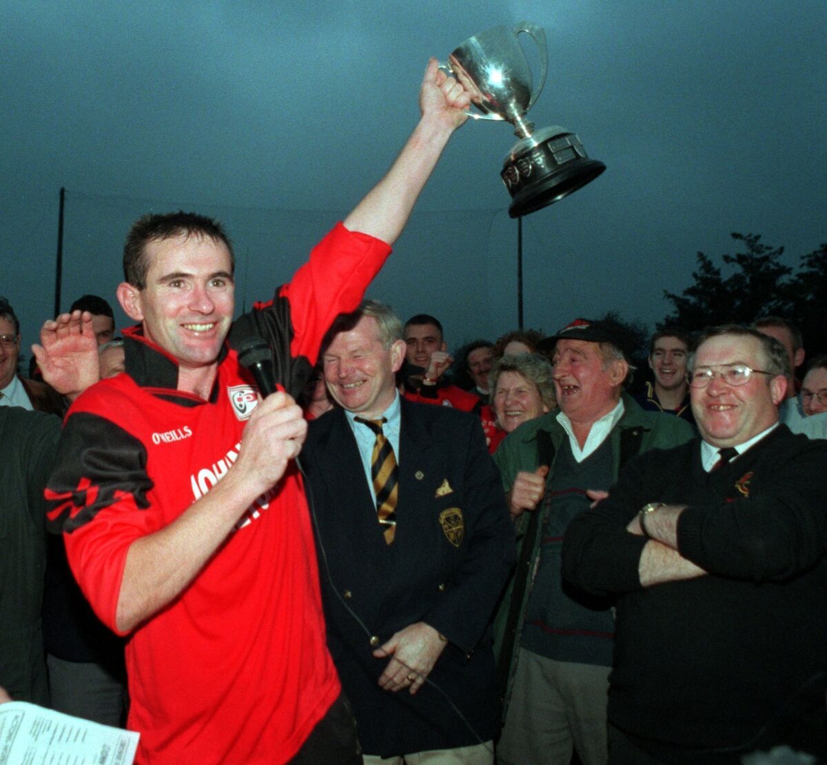 Crosshaven captain Brian Coniry raises the trophy after defeating Kinsale in 1998. Picture: Eddie O'Hare