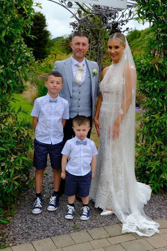 Laura O’Donoghue and Cian McDonnell with their sons Leon and Joey, who were page boys.
