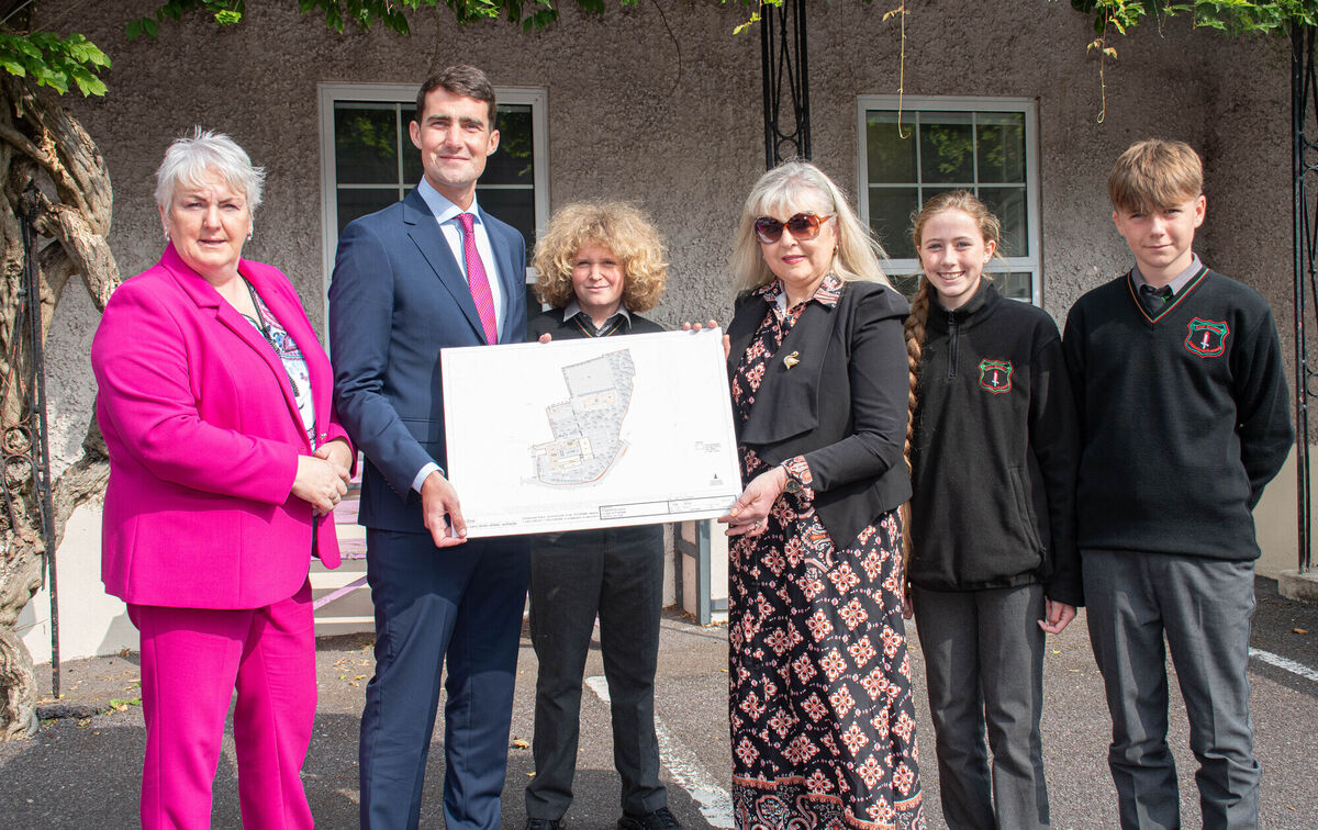 Pictured with the plans for the redevelopment of the school were Cllr Shiela O'Callaghan, Minister Jack Chambers TD, and Julie Dennehy O'Callaghan, Chair Parents Association with students Alex, Taillte, and Tom during the Minister's recent visit to Colaiste an Phiarsaigh in Glanmire. Picture: Howard Crowdy Pictured with the plans for the redevelopment of the school were Cllr Shiela O'Callaghan, Minister Jack Chambers TD, and Julie Dennehy O'Callaghan, Chair Parents Association with students Alex, Taillte, and Tom during the Minister's recent visit to Colaiste an Phiarsaigh in Glanmire. Picture: Howard Crowdy