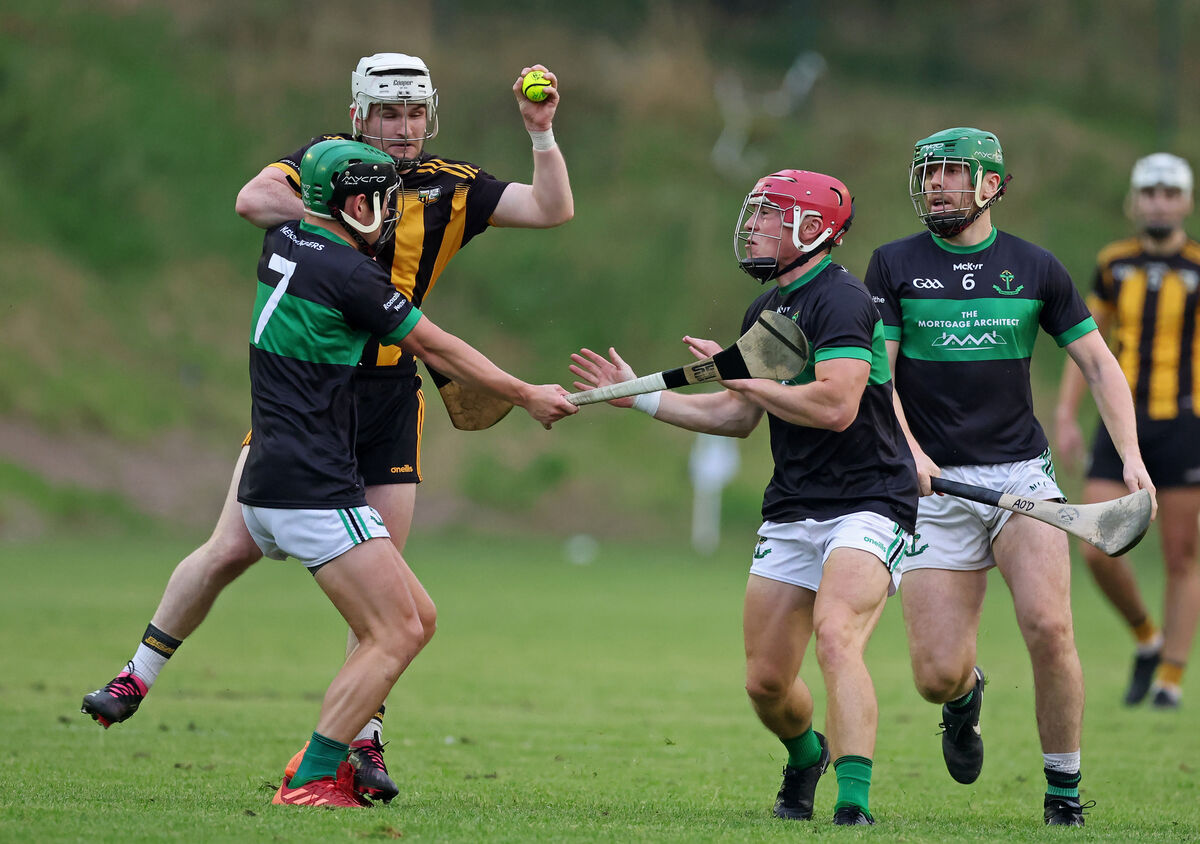 Kevin O'Donovan, Mark Cronin and Alan O'Donovan, Nemo Rangers, close in on Bertie Butler, Kilbrittain, in the Premier Junior Hurling Championship at Macroom. Picture: Jim Coughlan. Kevin O'Donovan, Mark Cronin and Alan O'Donovan, Nemo Rangers, close in on Bertie Butler, Kilbrittain, in the Premier Junior Hurling Championship at Macroom. Picture: Jim Coughlan.