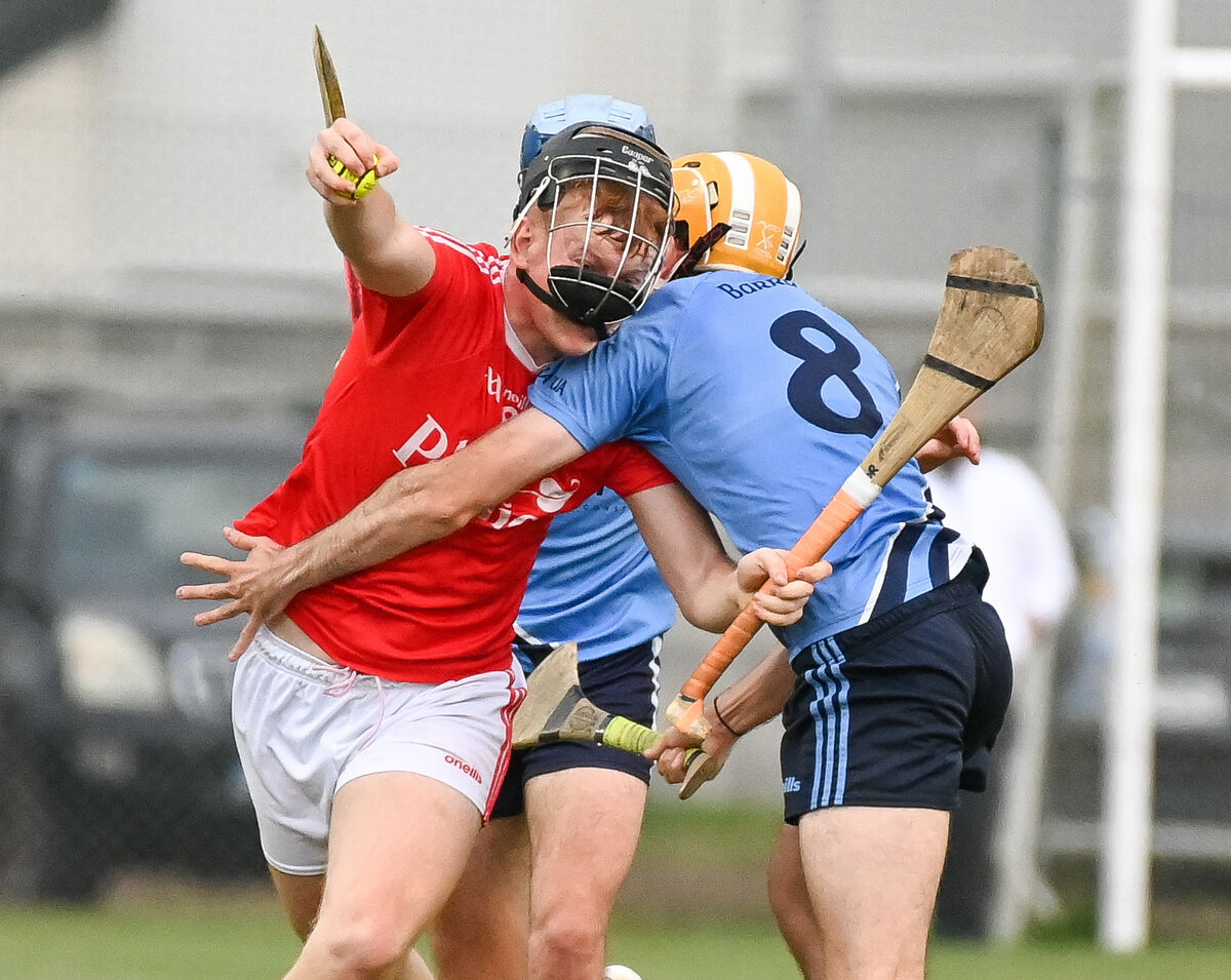 Ballygarvan's Cillian O'Regan is tackled by Barryroe's David Murphy, during their Premier JHC clash, at Cloughduv. Picture: David Keane.