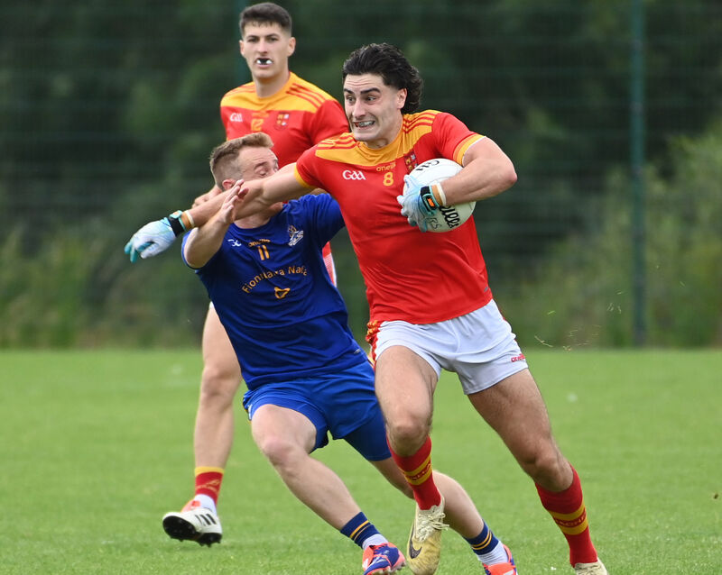 Mallow's Shane Merritt bursts past St Finbarr's Eoin McGreevy. Picture: Eddie O'Hare Mallow's Shane Merritt bursts past St Finbarr's Eoin McGreevy. Picture: Eddie O'Hare
