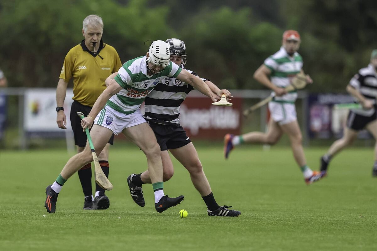 Ciaran O'Brien, St Ita's, battles with Daragh Egan, Midleton. Picture: Denis O'Flynn Ciaran O'Brien, St Ita's, battles with Daragh Egan, Midleton. Picture: Denis O'Flynn