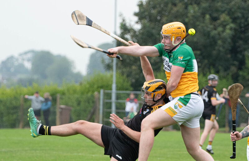 Fermoy's Darragh Daly clashes with Bride Rovers' Conor Hazelwood during the Co Op Superstores Senior A Hurling Championship match in Ballynoe. Picture: Howard Crowdy