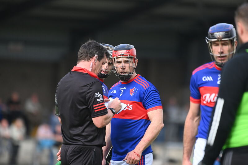 Jack Sheehan, Erins Own is booked for a foul on Conor Lehane. Pic Larry Cummins Jack Sheehan, Erins Own is booked for a foul on Conor Lehane. Pic Larry Cummins