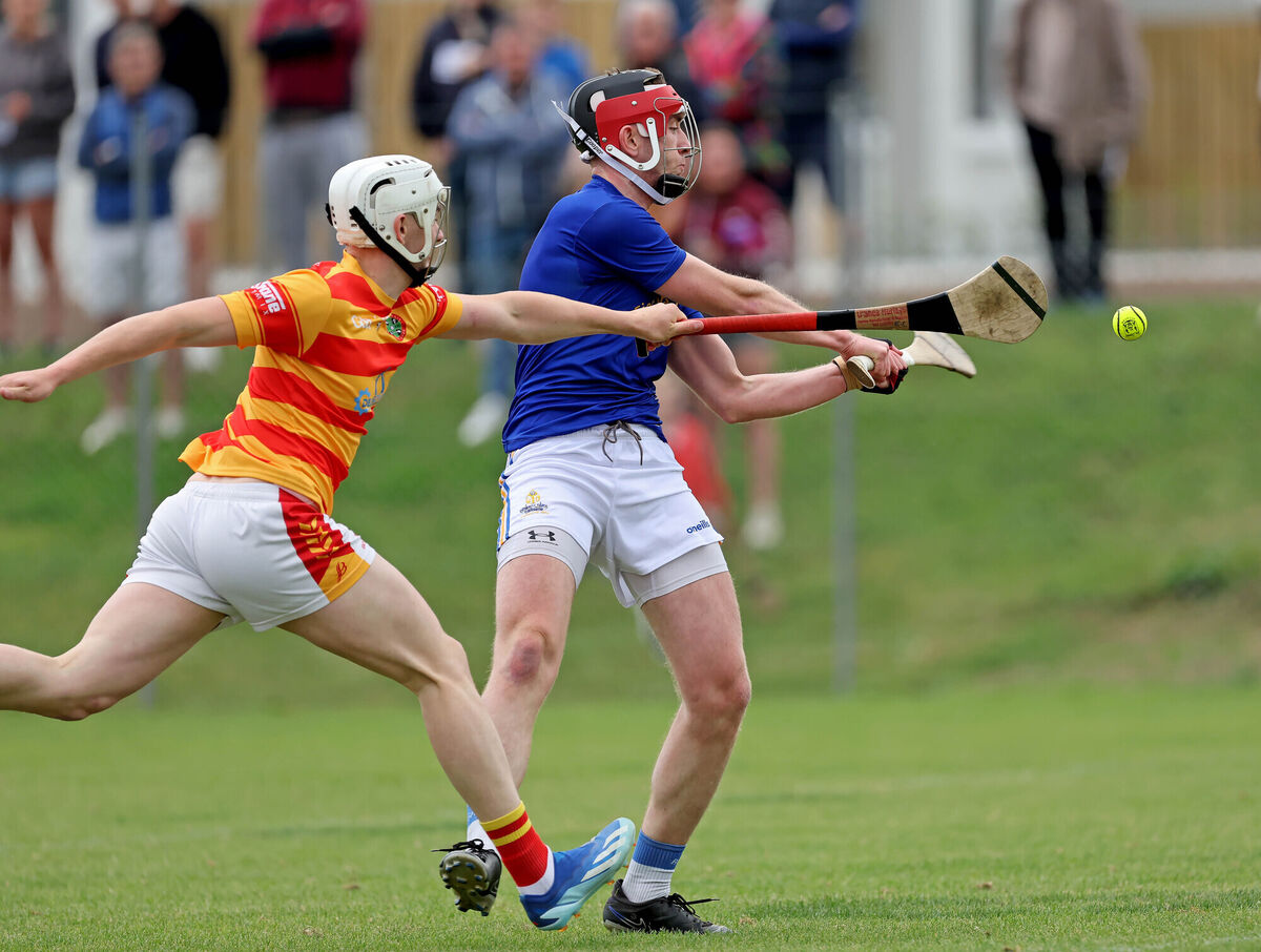Ethan Twomey of St Finbarr's gets his shot away to score the first goal under pressure from Eoghan Collins of Newcestown. Picture: Jim Coughlan Ethan Twomey of St Finbarr's gets his shot away to score the first goal under pressure from Eoghan Collins of Newcestown. Picture: Jim Coughlan