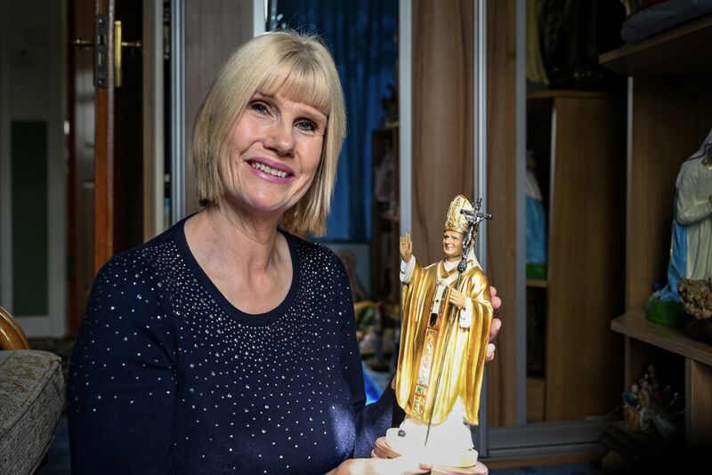 Mary Burke with a statue of Pope John Paul — her favourite item from a collection of scores of religious icons. Picture: Chani Anderson. Mary Burke with a statue of Pope John Paul — her favourite item from a collection of scores of religious icons. Picture: Chani Anderson.