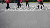 British primary school children playing in the playground