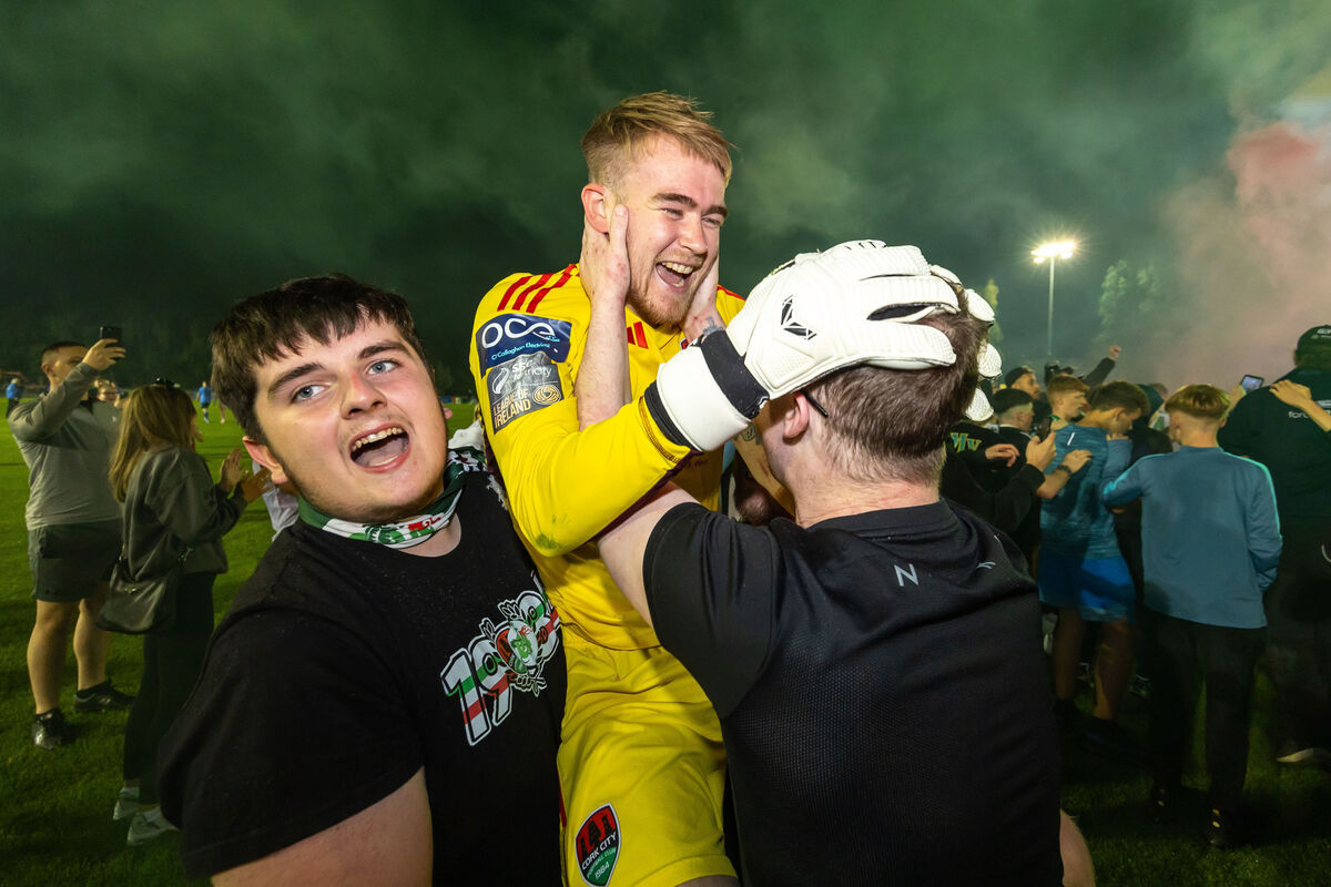 Cork goalkeeper Brad Wade celebrates winning the First Division and getting promoted to the Premier Division