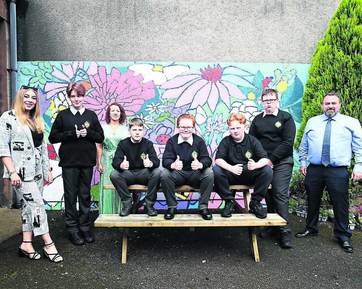 First year students Christian Jones, Leo Kukys, Tyler Castelo-Kirby, Dominic O’Brien, and Conor Dorgan Quirke, who are among the first 10 boys to attend Presentation Secondary School, Ballyphehane, with teacher Kerri Mullins, special needs assistant Marie Cronin, and principal Barry O’Shea.	Picture: Larry Cummins
                    