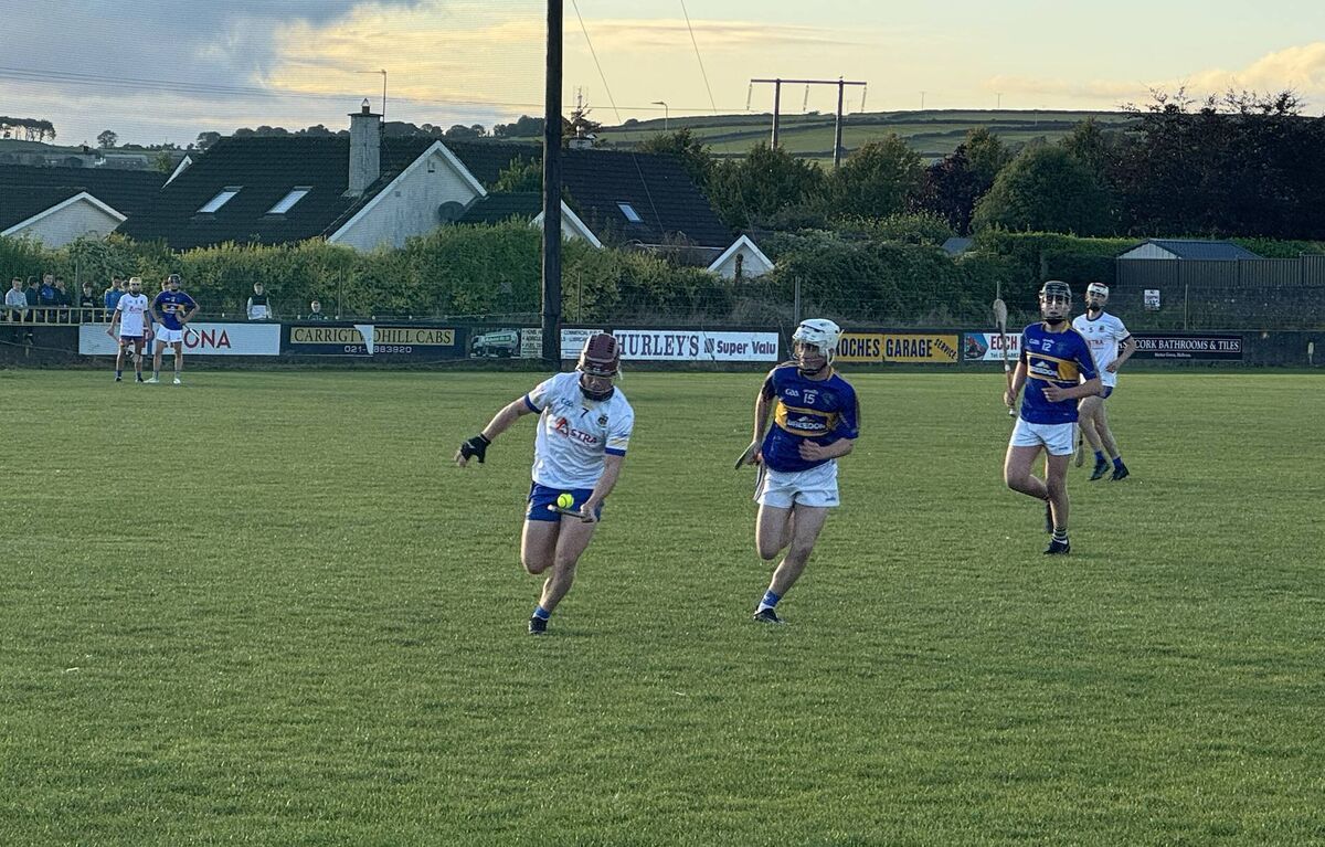Carrigaline captain Diarmaid Ó Beoláin gets away from Carrigtwohill's Ben Fitzgerald. Carrigaline captain Diarmaid Ó Beoláin gets away from Carrigtwohill's Ben Fitzgerald.