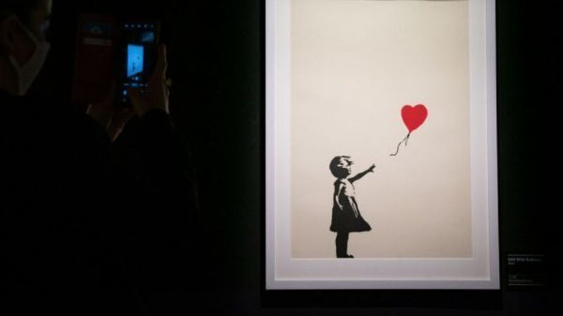 Two charged with burglary after Banksy painting stolen from London gallery Two charged with burglary after Banksy painting stolen from London gallery