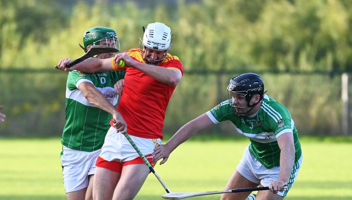 Mallow's Pa Healy is tackled by Aghabullogue's John Buckley and Cillian Timmons during their PIHC clash in Grenagh last month. Picture: Eddie O'Hare Mallow's Pa Healy is tackled by Aghabullogue's John Buckley and Cillian Timmons during their PIHC clash in Grenagh last month. Picture: Eddie O'Hare