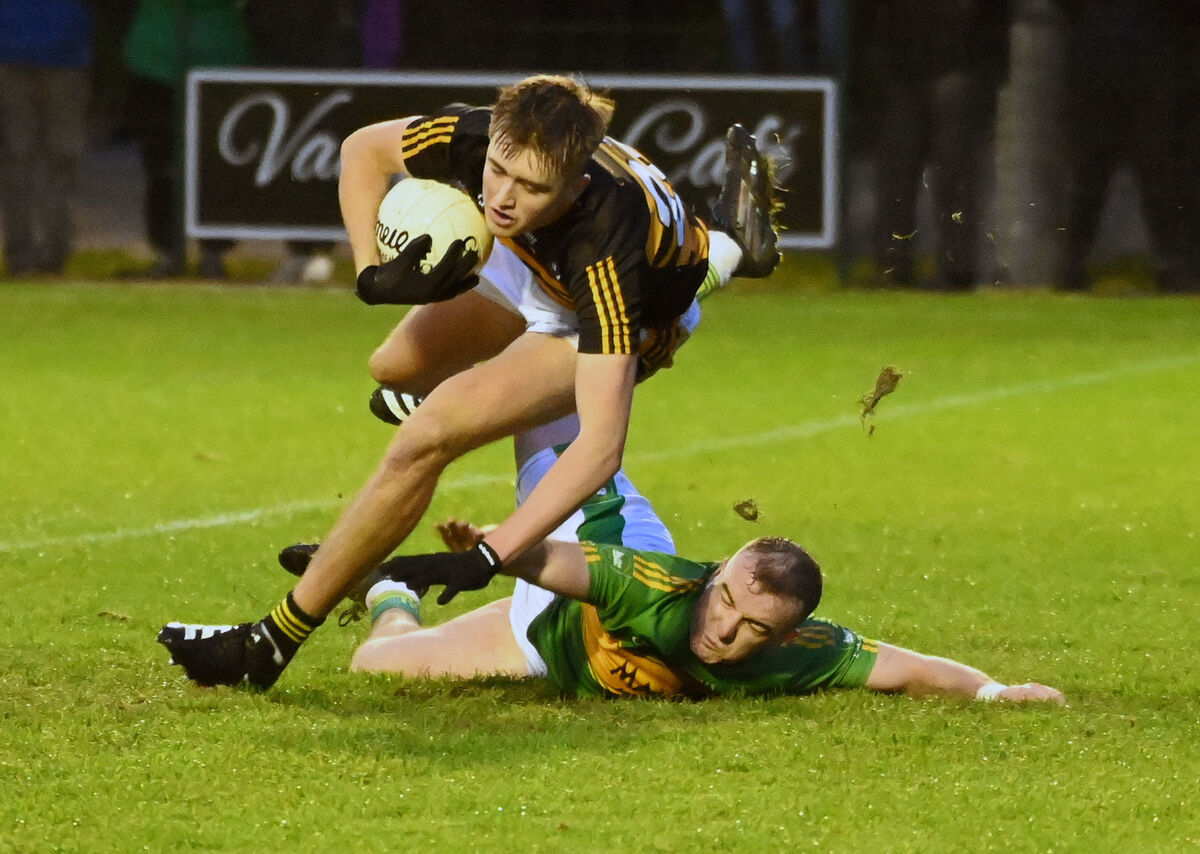 Canovee's Brian McNabola is tackled by Kilmurry's Brian Hinchion during the McCarthy Insurance Group Premier JFC at Macroom. Picture: Eddie O'Hare Canovee's Brian McNabola is tackled by Kilmurry's Brian Hinchion during the McCarthy Insurance Group Premier JFC at Macroom. Picture: Eddie O'Hare