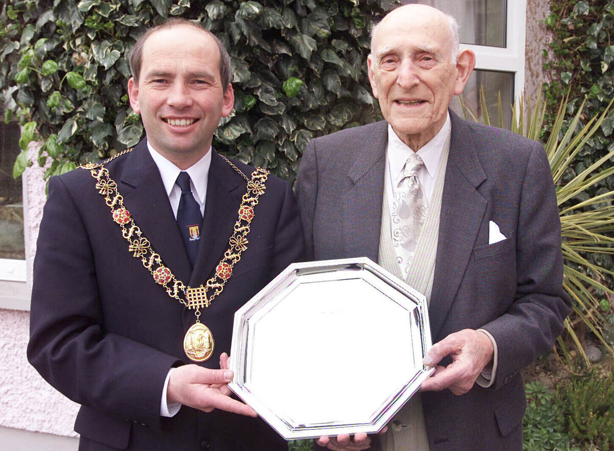 Then lord mayor Cllr. Tom O'Driscoll making a presentation to former lord mayor Mr Gerald Goldberg on the occassion of his 90th Brithday over the weekend Photograph Mark Kelleher. Then lord mayor Cllr. Tom O'Driscoll making a presentation to former lord mayor Mr Gerald Goldberg on the occassion of his 90th Brithday over the weekend Photograph Mark Kelleher.