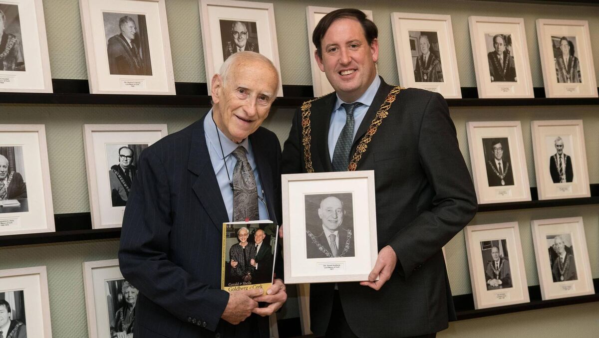 David Goldberg picks out his father Gerald Goldberg's photograph in the gallery of lord mayors of Cork. With Cllr Kieran McCarthy, former lord mayor of Cork City at the launch of David's book ‘Gerald & Sheila Goldberg of Cork: A Son’s Perspective’. lord mayor’s Council Chambers, Cork City Hall. Picture: Rob Lamb David Goldberg picks out his father Gerald Goldberg's photograph in the gallery of lord mayors of Cork. With Cllr Kieran McCarthy, former lord mayor of Cork City at the launch of David's book ‘Gerald & Sheila Goldberg of Cork: A Son’s Perspective’. lord mayor’s Council Chambers, Cork City Hall. Picture: Rob Lamb