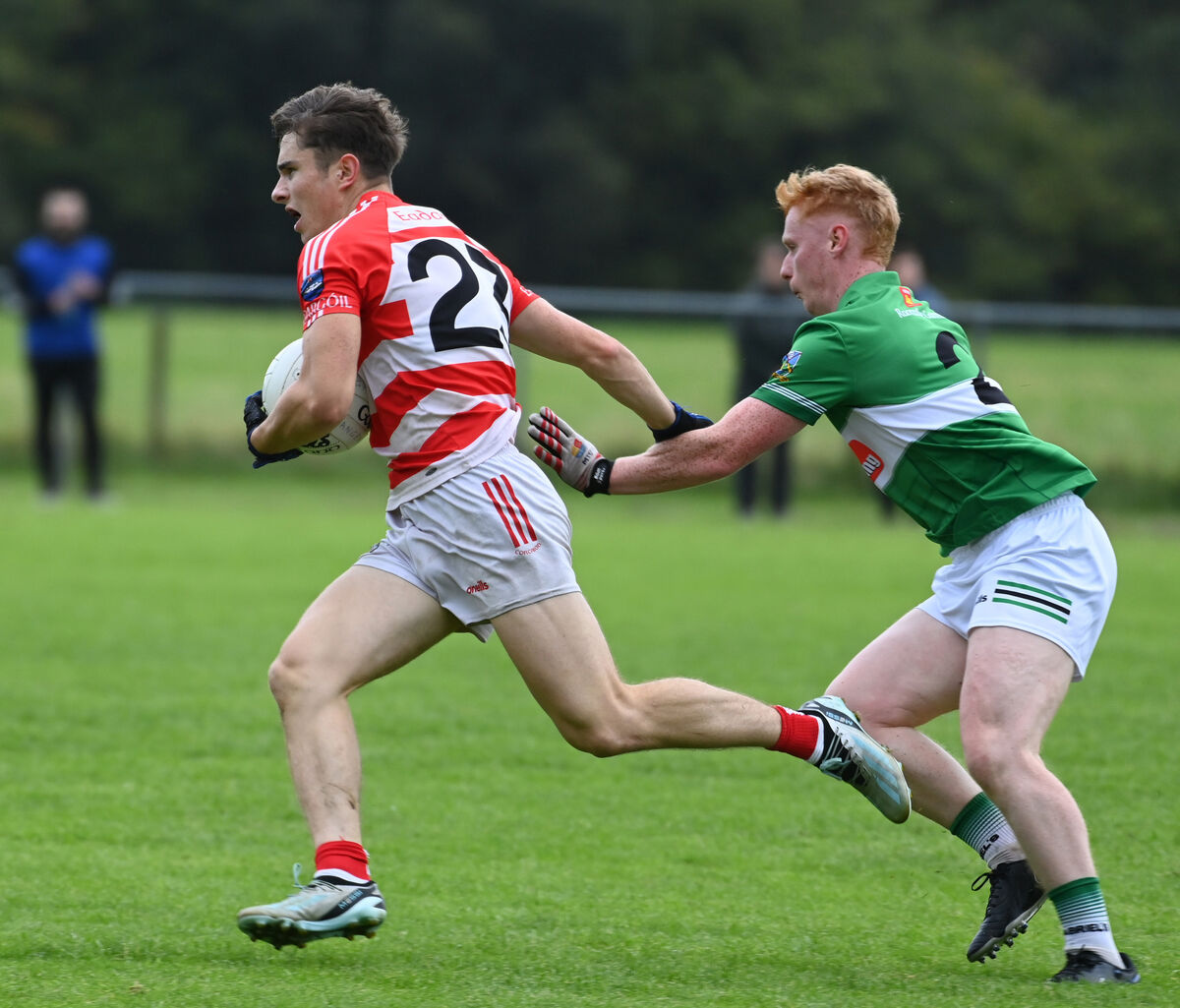 Adrigole's Ben O'Sullivan breaks from Gabriel Rangers Liam Hodnett. Picture: Eddie O'Hare Adrigole's Ben O'Sullivan breaks from Gabriel Rangers Liam Hodnett. Picture: Eddie O'Hare