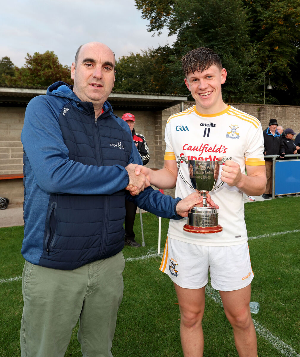  Steven Lynch, Rebel Og, presents Jack Cullinane Bandon with the cup after their P2 Minor Hurling final win over Youghal earlier this month. Picture: Jim Coughlan.