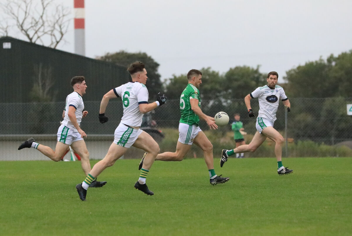 Aghada's Scott Whyte runs at the Ilen Rovers defence. Picture: David Creedon