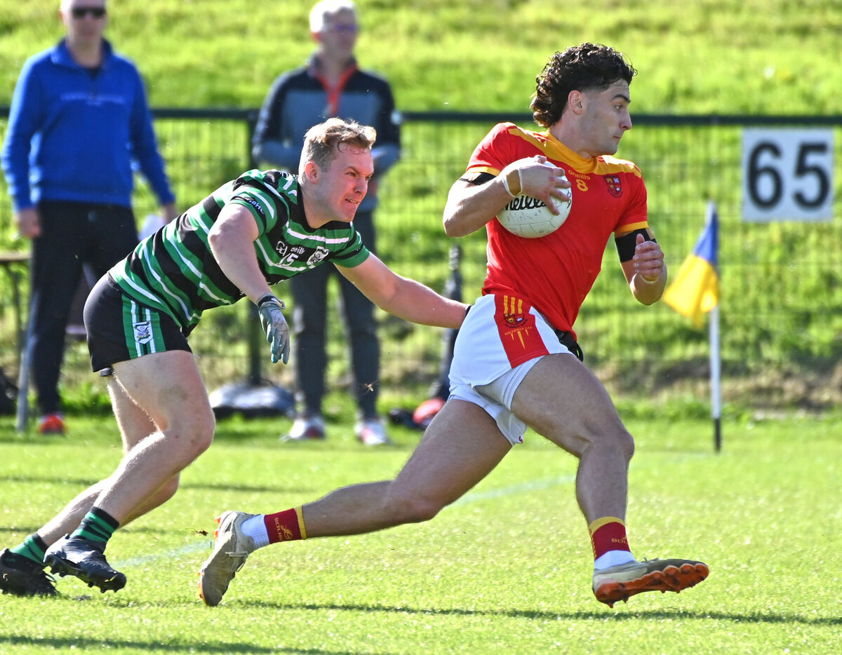 Mallow's Shane Merritt bursting past Douglas' Colm Joyce. Picture: Eddie O'Hare Mallow's Shane Merritt bursting past Douglas' Colm Joyce. Picture: Eddie O'Hare