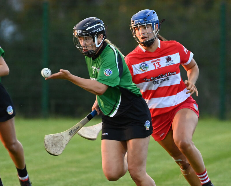 Killeagh's Laura Treacy passes away from Courcey Rovers' Eimear O'Reilly. Picture: Eddie O'Hare Killeagh's Laura Treacy passes away from Courcey Rovers' Eimear O'Reilly. Picture: Eddie O'Hare