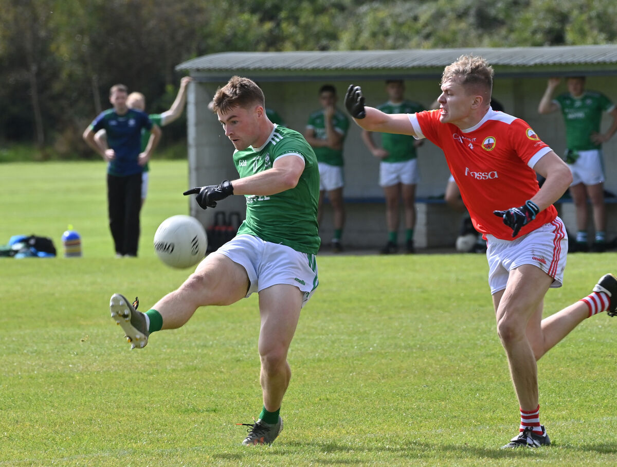  Fionn Herlihy, Dohenys, kicking a point under pressure from Padraig O'Neill, O'Donovan Rossa. Picture: Dan Linehan