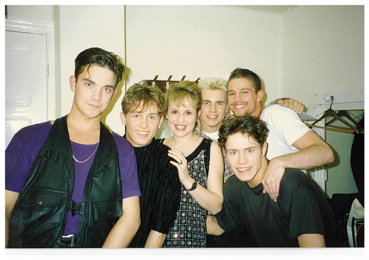 Nicki Chapman with Take That. Picture: Nicki Chapman/PA
