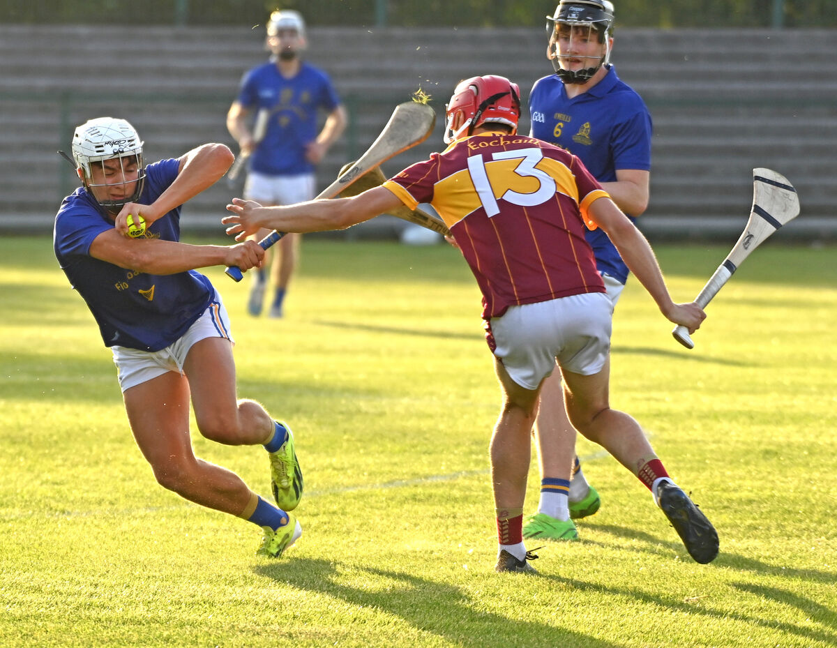 St Finbarr's Daniel Burke moves past Youghal's Jamie Lenane during the Rebel Óg Premier 2 MHC semi-final at MTU Cork. Picture: Eddie O'Hare