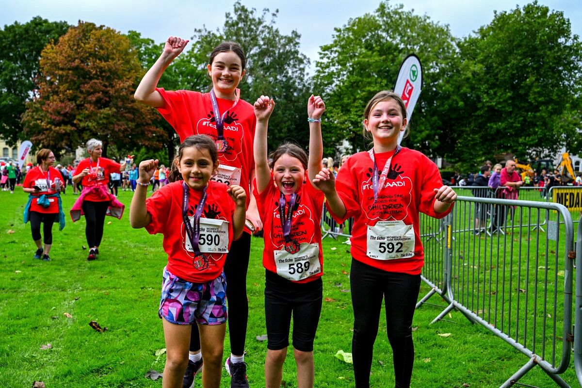 Anna Dolic, Megan O'Donovan, Olivia Forbes and Emily O'Donovan with their medals after participating in the Echo mini marathon on behalf of Autism Assistance Dogs. Picture: Chani Anderson