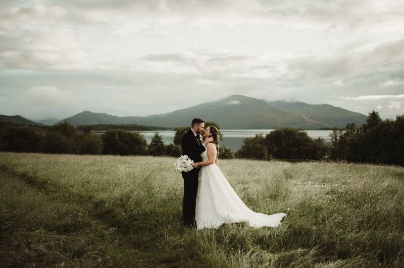 Laura O’Sullivan and Niall Vaughan with Killarney Lake in the background.