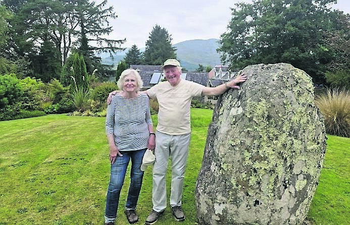 Louise and Stephen Austen at the standing stone in Gearha Garden