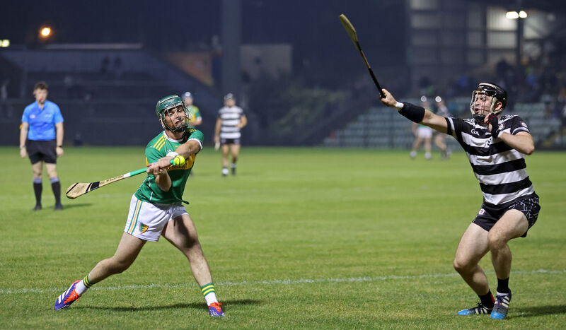  Sam Quirke, Midleton, tries to block a pass by Conor Griffin, Newtownshandrum. Picture: Jim Coughlan.
