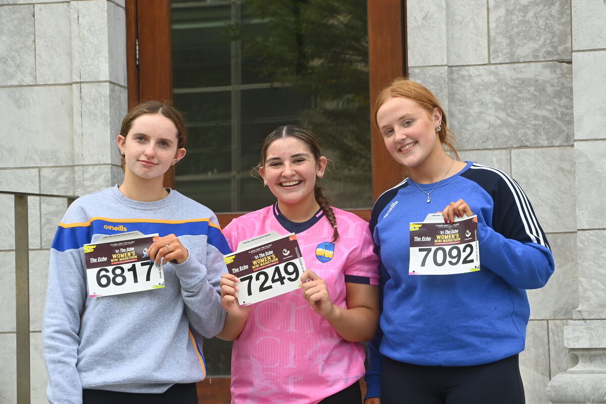 Grenagh girls Ellen Callaghan, Bethany Twohig and Allie OâConnell with be fundraising for the HOPE Foundation. Collecting their race numbers for The Echo Mini Marathon. Pic Larry Cummins