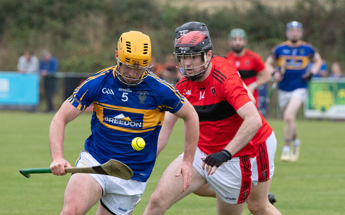 Carrigtwohill's Brendan Twomey pulls away from Cloyne's Michael Cahill. Picture: Howard Crowdy Carrigtwohill's Brendan Twomey pulls away from Cloyne's Michael Cahill. Picture: Howard Crowdy