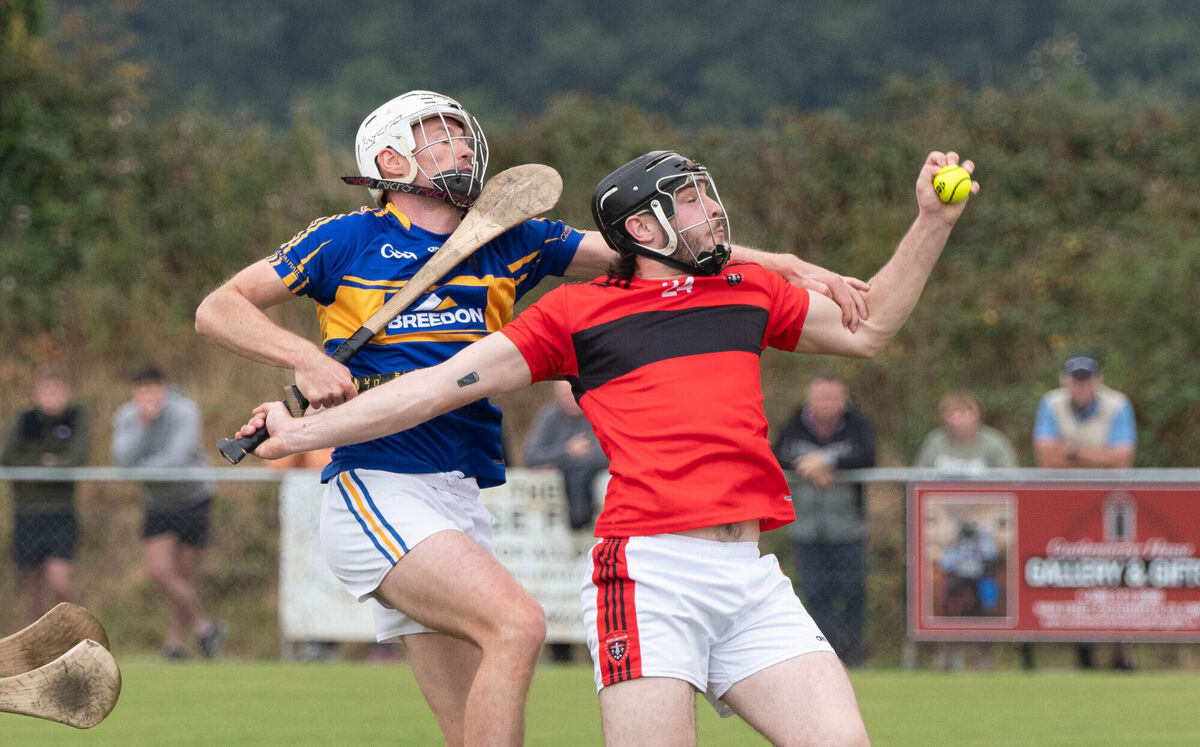 Cloyne's Jack Hallahan holds onto the sliothar despite the challenge from Carrigtwohill's Padraic Hogan. Picture: Howard Crowdy Cloyne's Jack Hallahan holds onto the sliothar despite the challenge from Carrigtwohill's Padraic Hogan. Picture: Howard Crowdy