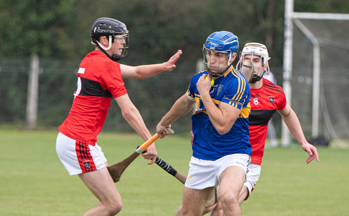 Carrigtwohill's Sean Walsh holds onto the sliotar ahead of Cloyne's Diarmuid Byrne during the SAHC Relegation Play Off match in Castlemartyr. Picture: Howard Crowdy Carrigtwohill's Sean Walsh holds onto the sliotar ahead of Cloyne's Diarmuid Byrne during the SAHC Relegation Play Off match in Castlemartyr. Picture: Howard Crowdy